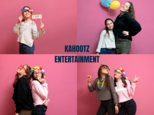 girls have fun in photo booth
